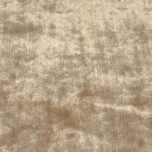 Warm caramel beige plain fabric swatch with a softly mottled, velvety surface