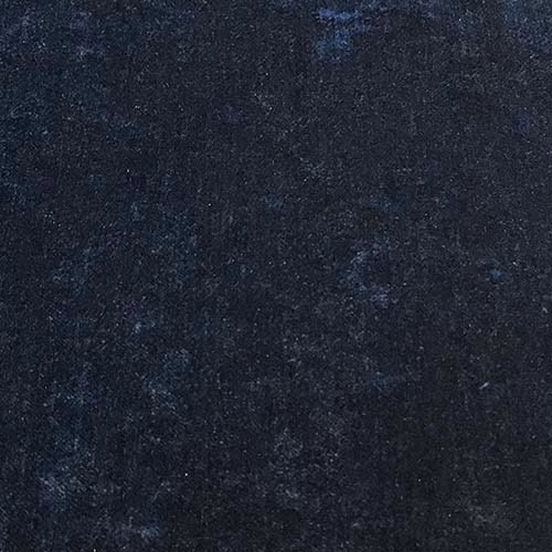 Deep mottled denim-blue plain fabric with a soft worn texture