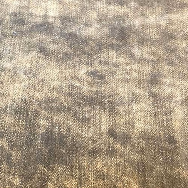 Close-up of mottled French grey plain fabric with soft taupe undertones