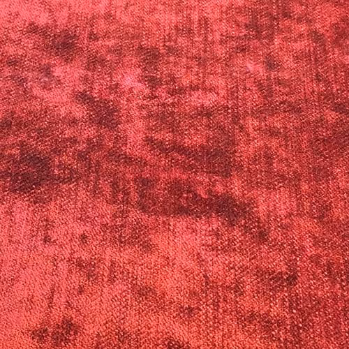 Close-up of richly mottled fuchsia pink plain fabric with velvety texture