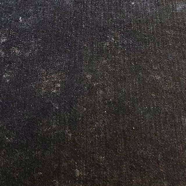 Close-up of deep charcoal-black plain fabric with a soft, low-sheen texture