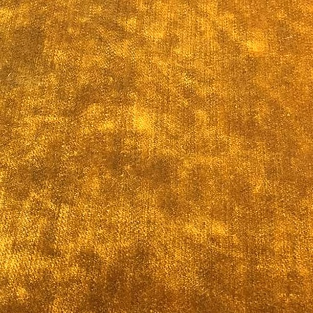 Mottled warm gold plain fabric with a softly brushed, velvety texture