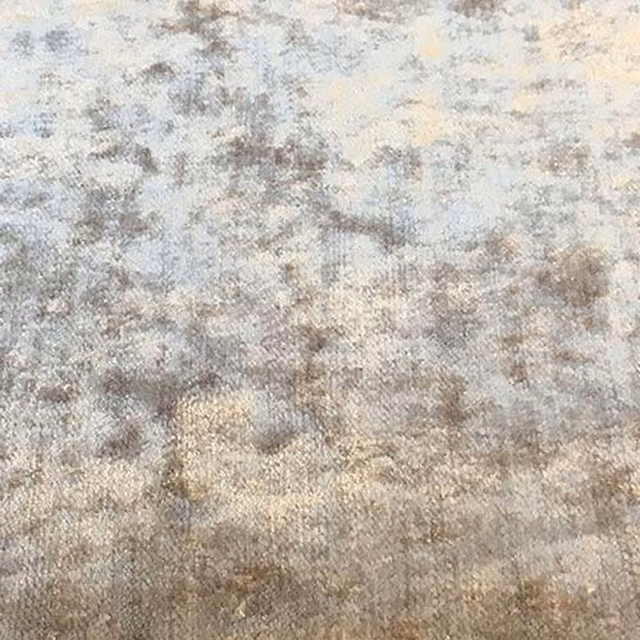 Mottled lavender-grey plain fabric with a softly brushed texture