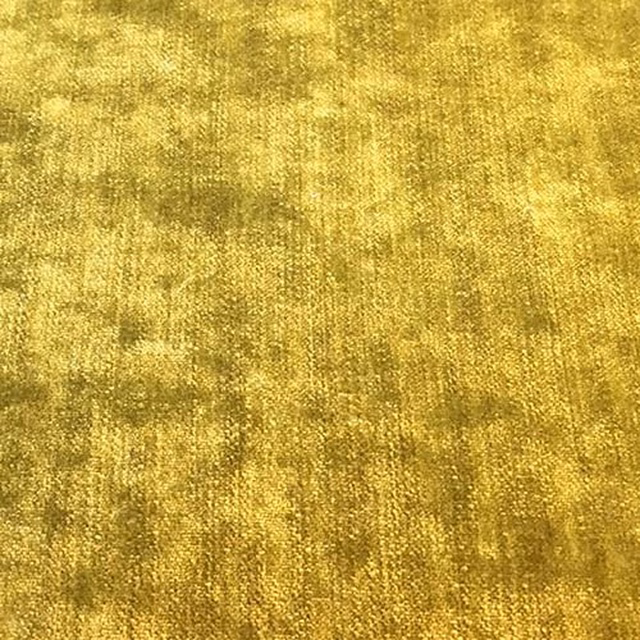 Close-up of lime-yellow plain fabric with a soft velvety sheen and subtle striated texture