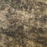 Close-up of smoky taupe and charcoal mottled plain woven fabric
