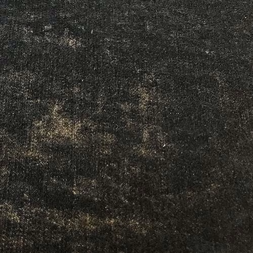 Close-up of a deep midnight black plain fabric with subtle mottled tonal flecks