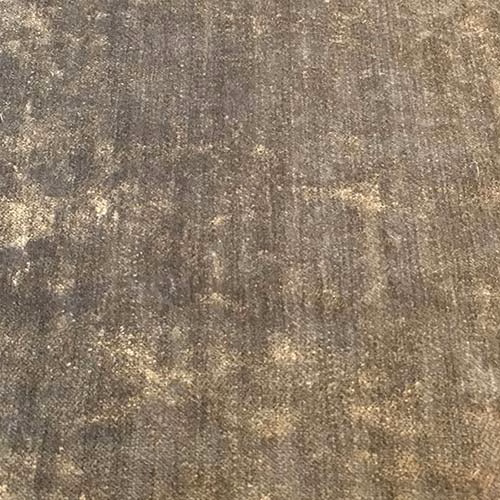 Close-up of warm mink-brown plain fabric with subtle golden tonal flecking