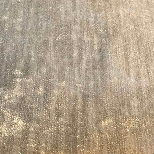 Warm parchment beige plain fabric with fine vertical striations and a soft sheen