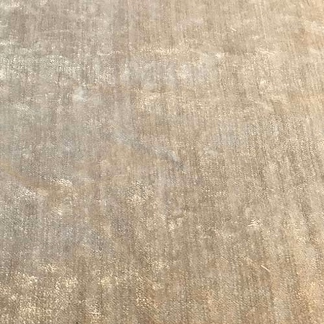 Close-up of Modena Pebble fabric in warm beige with subtle mottled sheen