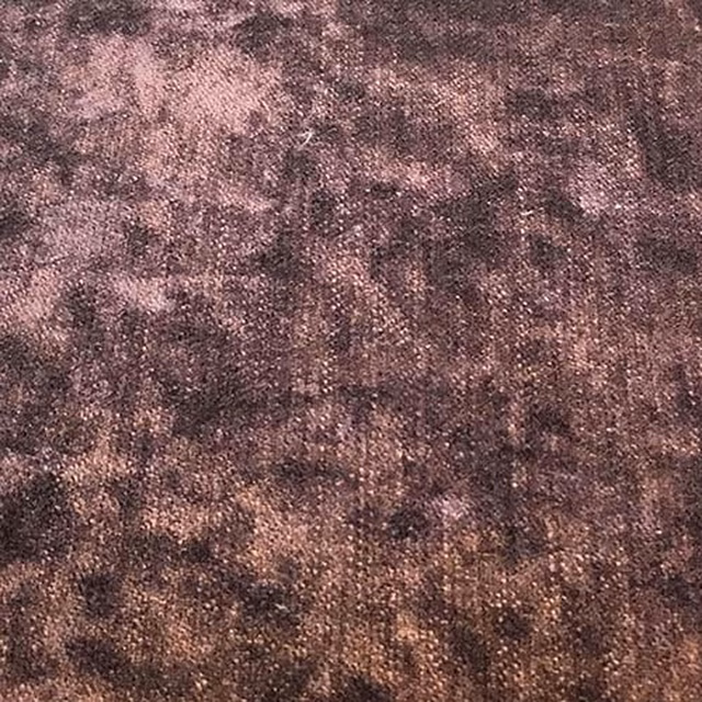 Smoky plum mottled plain fabric swatch with soft velvety texture