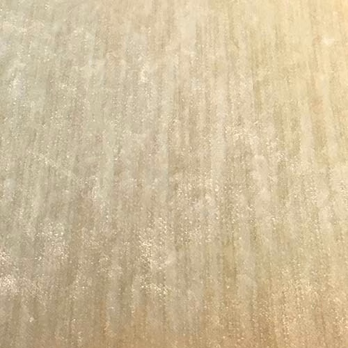 Warm stone beige plain fabric with subtle vertical sheen and fine texture