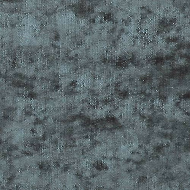 Close-up of a muted teal plain fabric with mottled texture and soft sheen