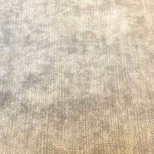 Pale wicker-beige plain fabric with a fine, subtly mottled woven texture