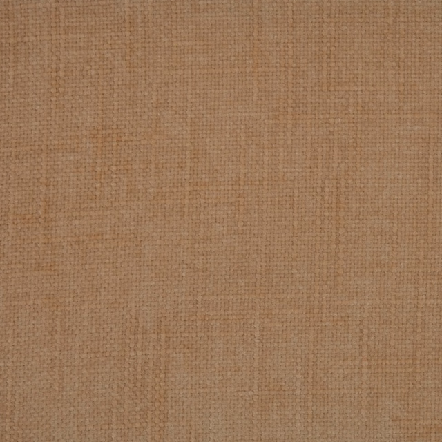Soft apricot tan plain weave fabric with a subtle matte, slightly mottled texture