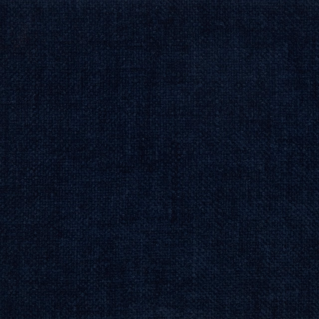 Close-up of a deep navy plain weave fabric with a fine textured surface