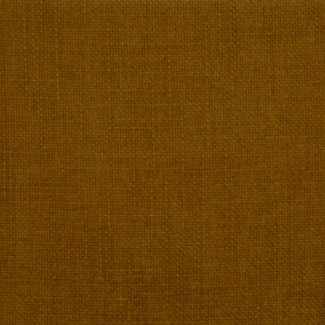 Close-up of deep ochre-gold plain woven fabric with a fine textured surface