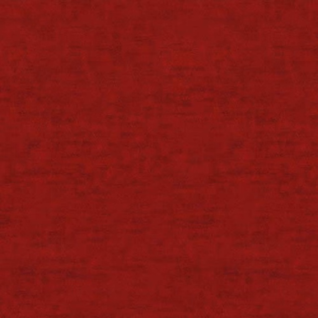 Deep ruby red plain fabric with a softly mottled matte surface