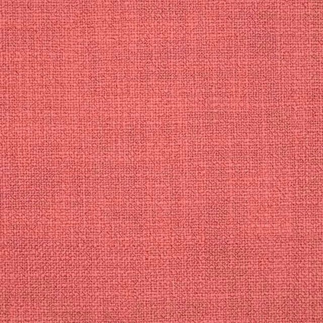 Coral pink plain woven fabric with a fine textured surface