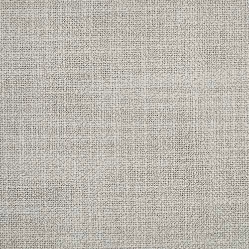 Close-up of a pale mist grey woven plain fabric with fine speckled texture