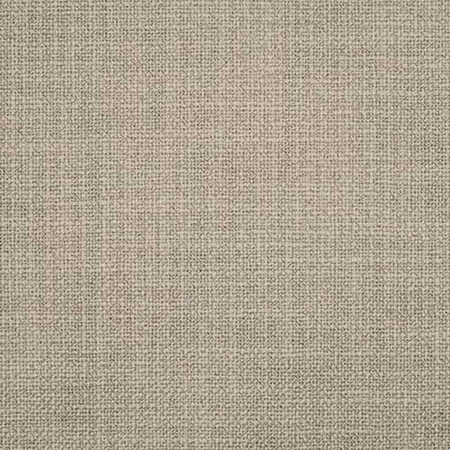 Close-up of warm sandstone beige woven plain fabric with fine texture