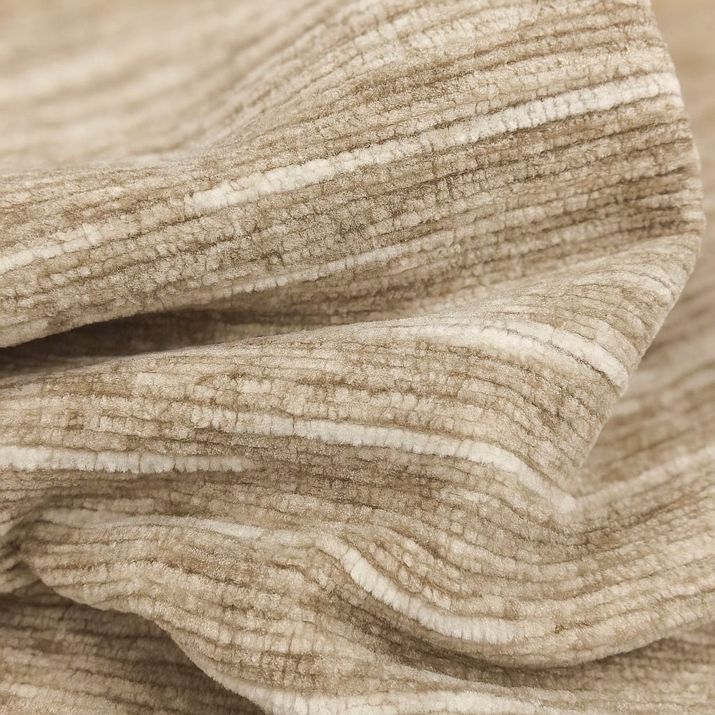 Close-up of warm barley beige ribbed plain fabric with soft cream tonal striations