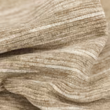 Close-up of warm barley beige ribbed plain fabric with soft cream tonal striations