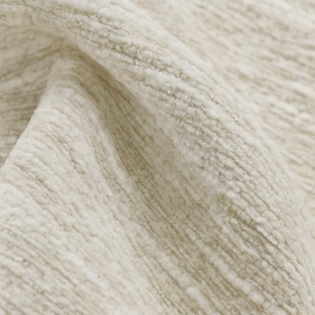 Cream slub-textured plain fabric with a soft brushed, nubby surface