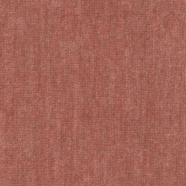 Close-up of dusky pink plain woven fabric with a subtle textured grain