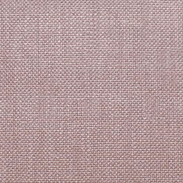 Close-up of a soft blush pink plain weave fabric with a fine textured surface