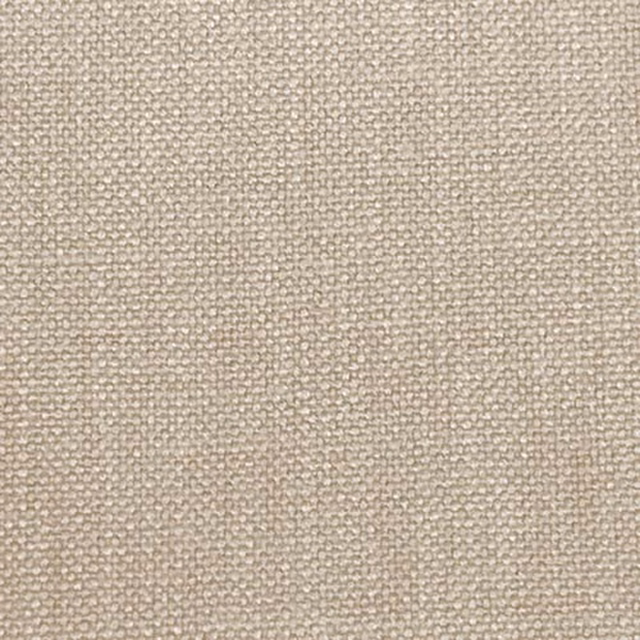 Close-up of soft beige woven plain fabric with fine textured surface