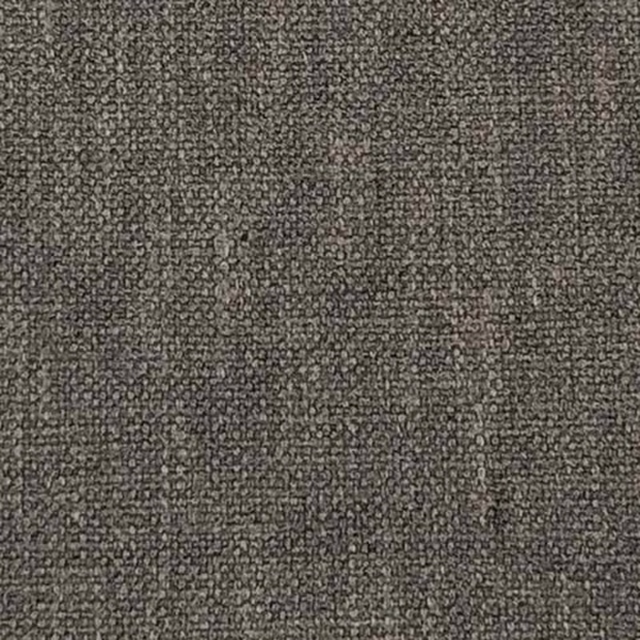 Close-up of a weathered iron-grey plain weave with fine pebbled texture