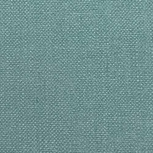 Close-up of a soft marine teal plain weave fabric with fine textured surface