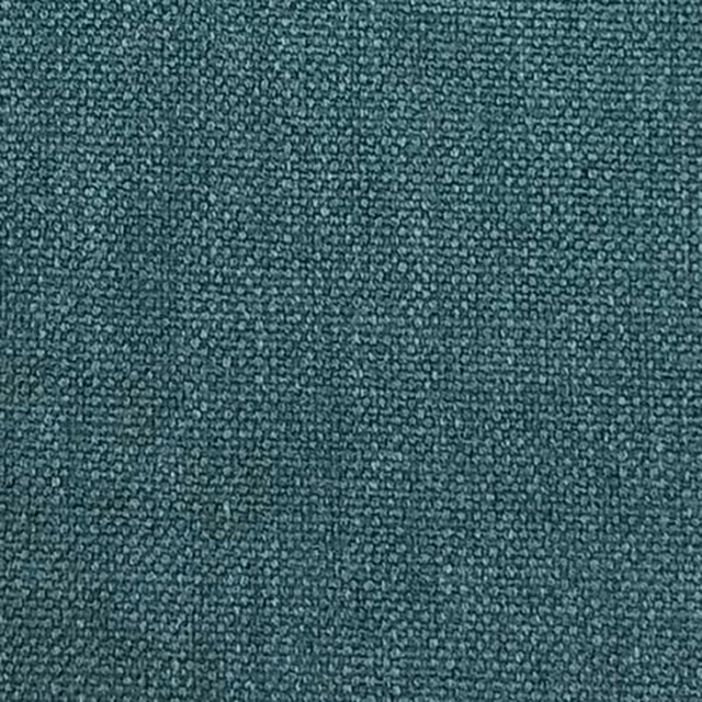 Close-up of a pebbly teal-blue woven fabric with a dense plain texture.