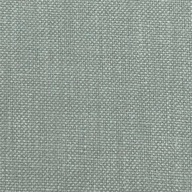 Soft peppermint green plain woven fabric with a fine pebbled texture