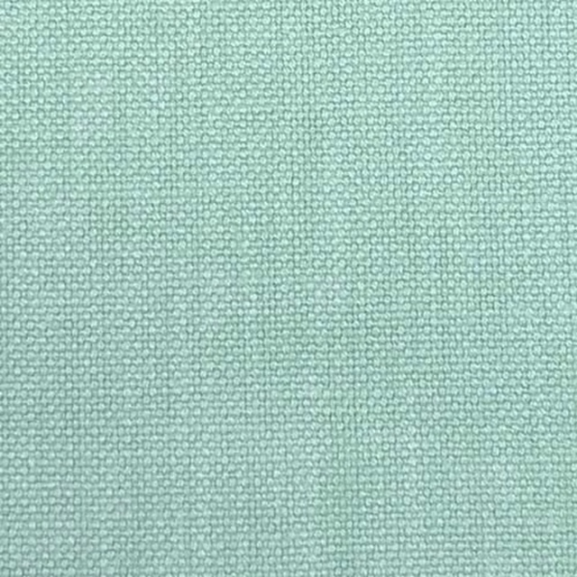 Pale mint green plain fabric swatch with fine textured weave