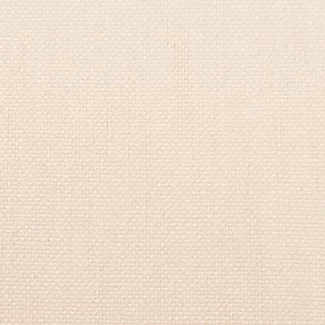 Close-up of a soft ivory plain weave fabric with fine texture