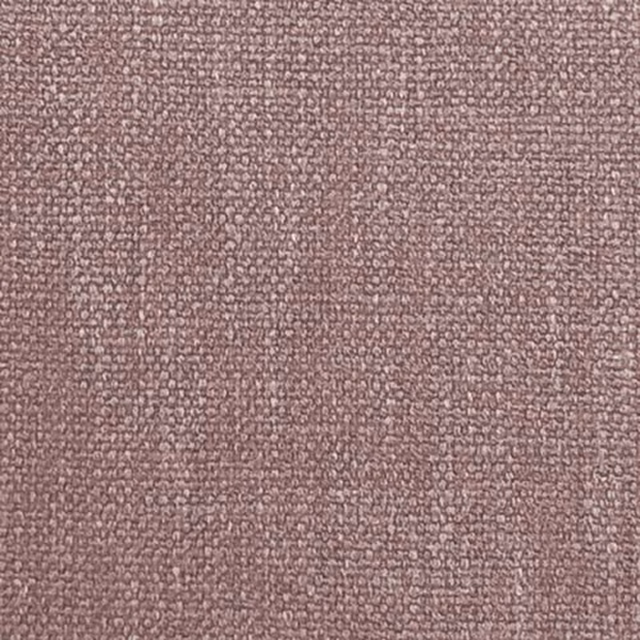 Close-up of muted thistle-pink plain weave fabric with a nubby texture