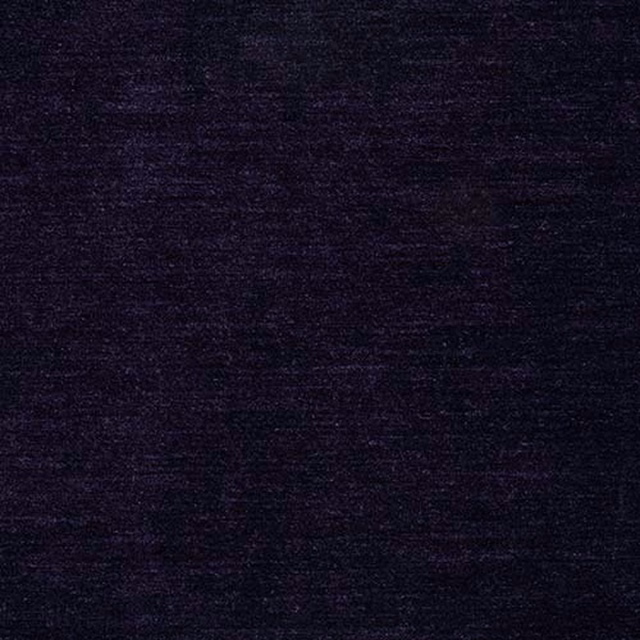 Close-up of dark aubergine velvet with a subtle low-sheen pile