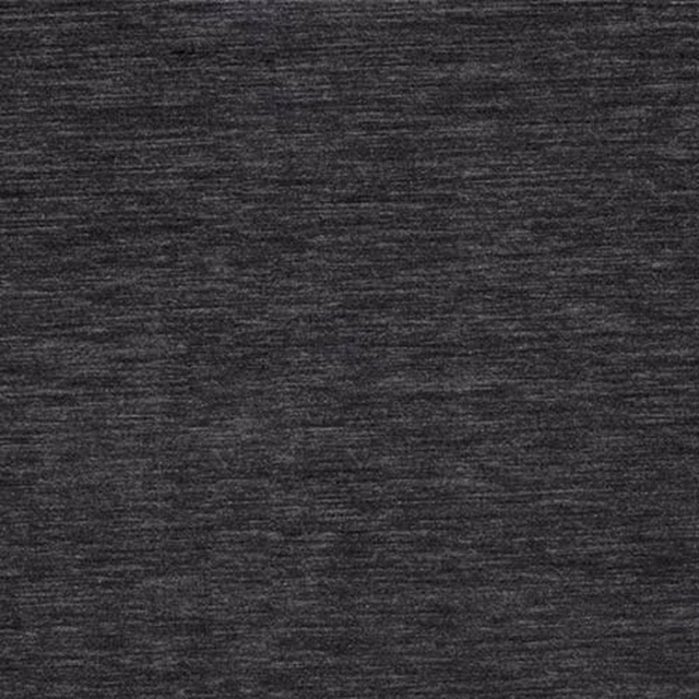 Close-up of dark graphite velvet with subtle tonal striations and a soft nap