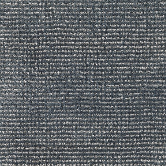 Cool slate blue-grey carpet with dense nubby horizontal rows and pale flecks