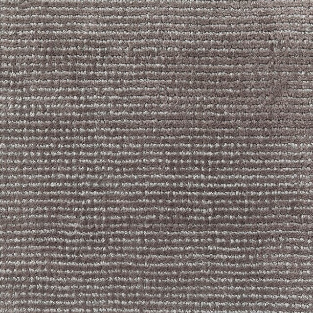 Muted taupe-grey carpet textile with compact horizontal ribs and pale flecked texture