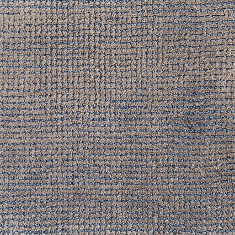 Muted blue-grey and taupe carpet weave with irregular horizontal rows