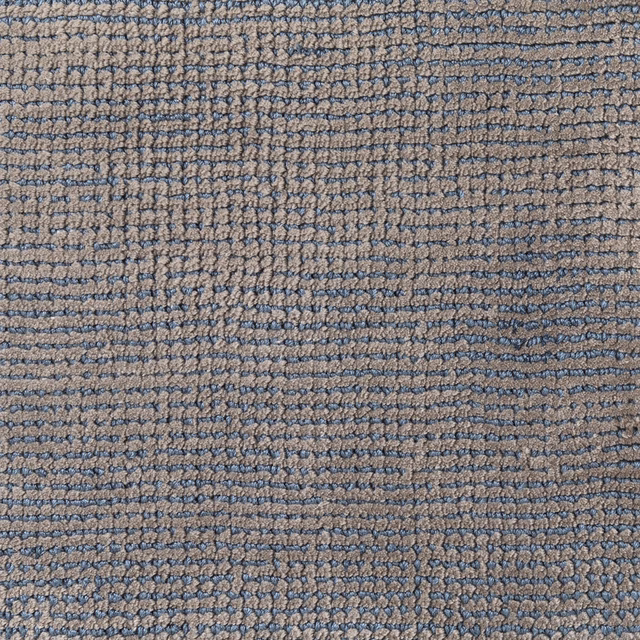 Muted blue-grey and taupe carpet weave with irregular horizontal rows
