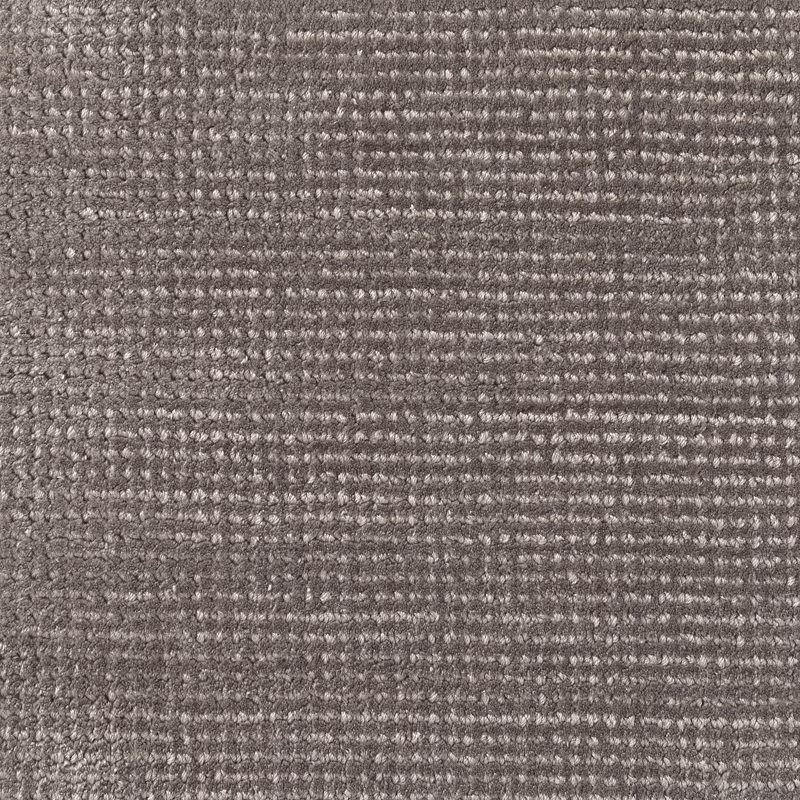 Warm charcoal-grey textile with pale flecks and densely ridged horizontal weave
