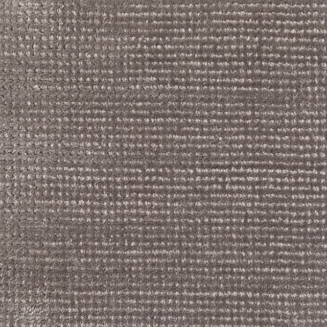 Warm charcoal-grey textile with pale flecks and densely ridged horizontal weave