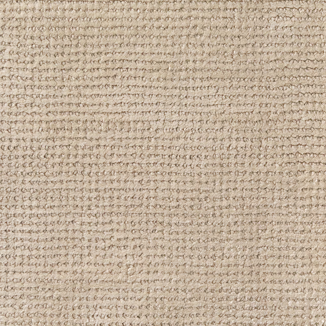 Warm oatmeal-beige carpet textile with irregular horizontal loops and flecked texture
