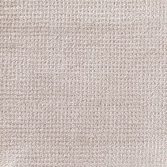 Pale platinum greige carpet textile with a dense, nubby woven surface