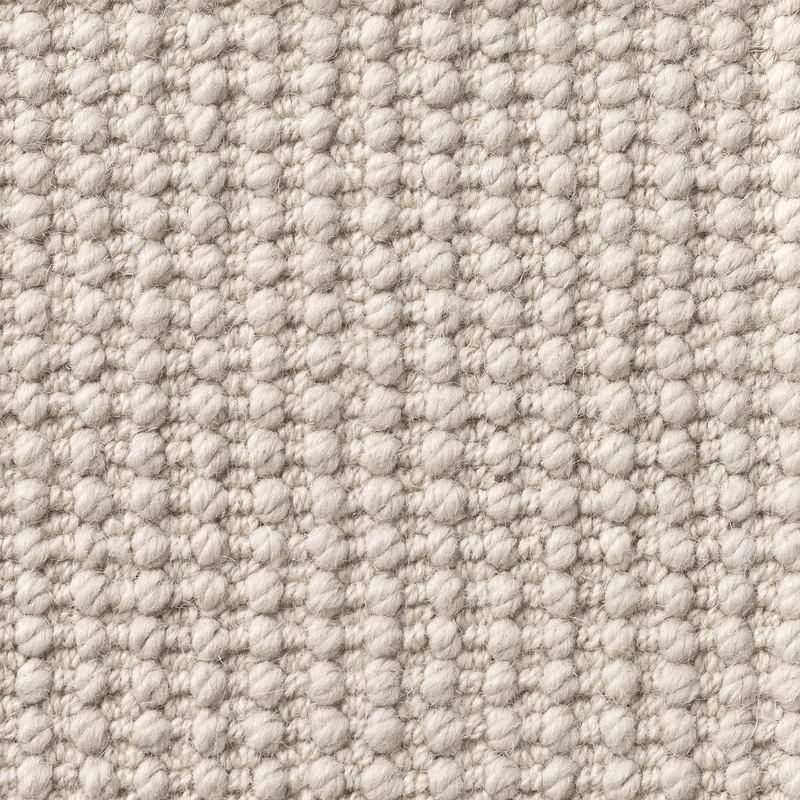 Warm putty nubby texture with ivory and taupe flecks in a close-up swatch