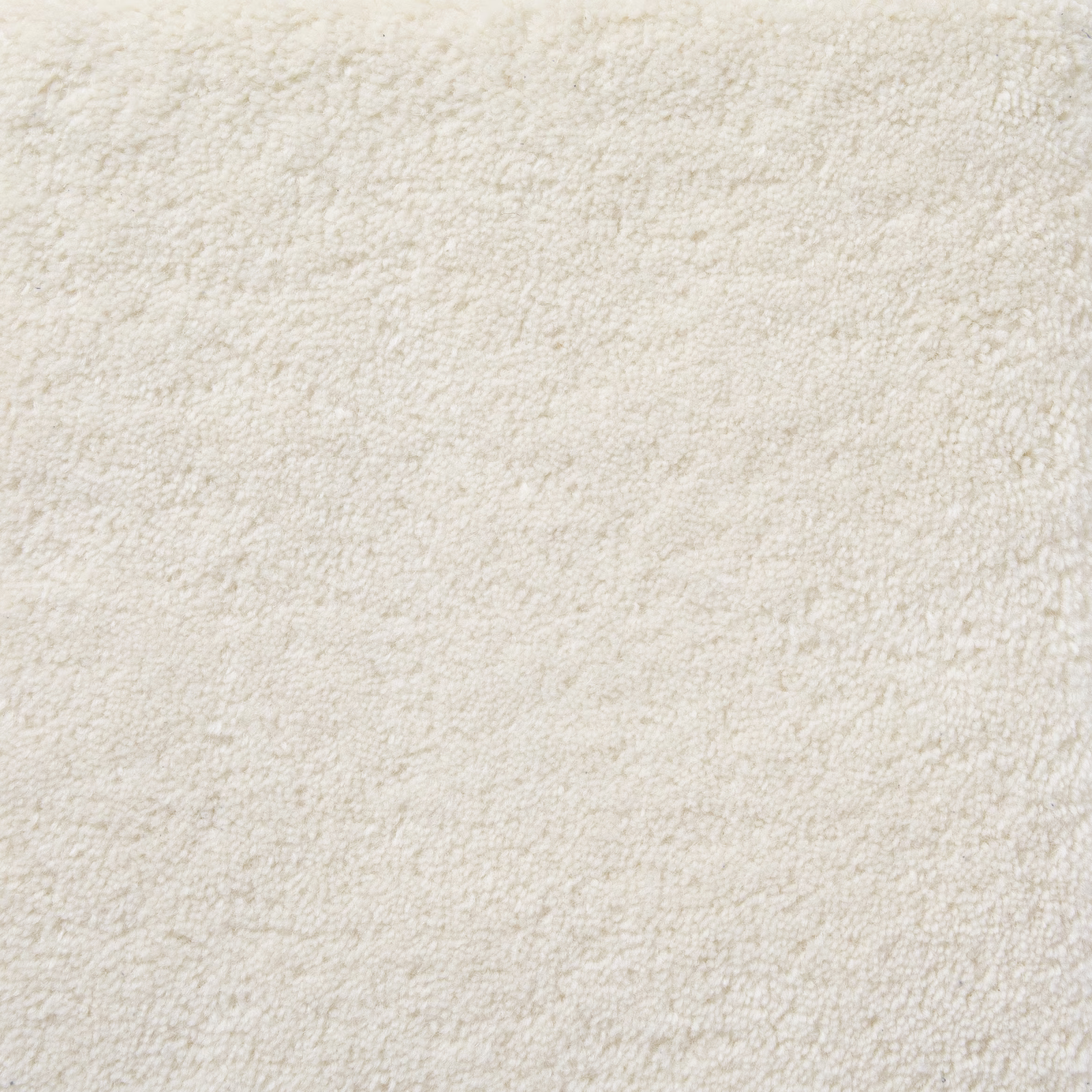 Vanilla cream carpet swatch showing a softly nubby, mottled pile