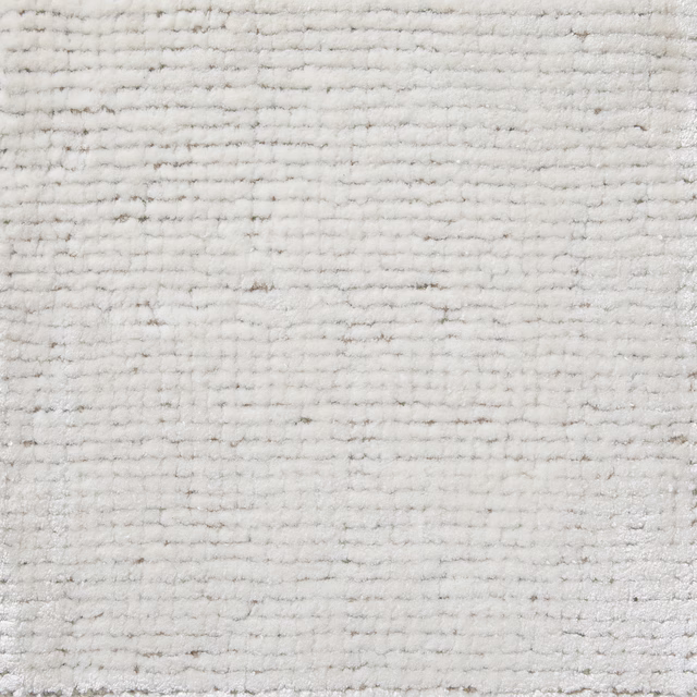 Close-up of Frost carpet in cool off-white with irregular horizontal ridges and grey flecks